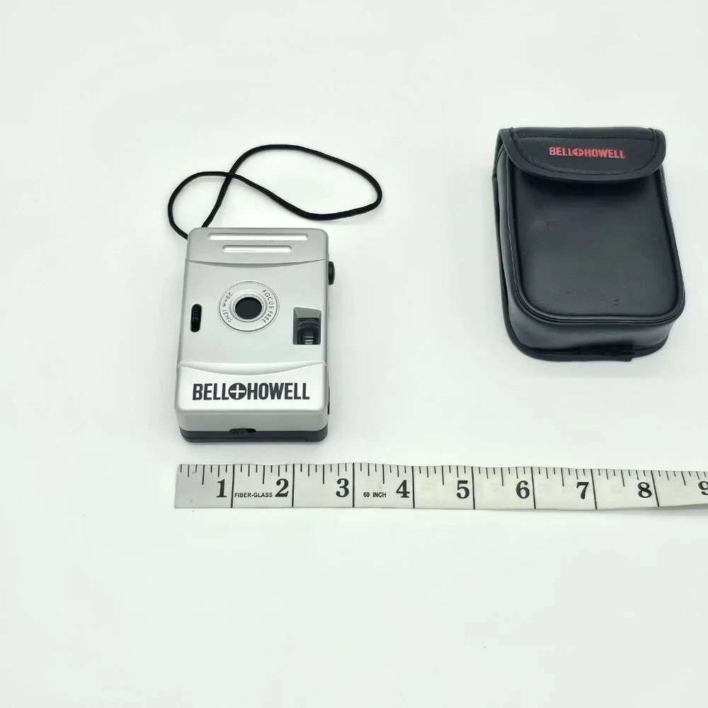 Vtg Bell Howell Point Shoot 35MM Camera Silver Focus Free 28MM Lens Black Case